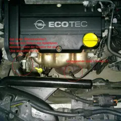 Opel Motorraum mit markiertem Öldruckschalter und Lambdasonde. Frage: Wie kommt Öl in den Kabelbaum? p0141.