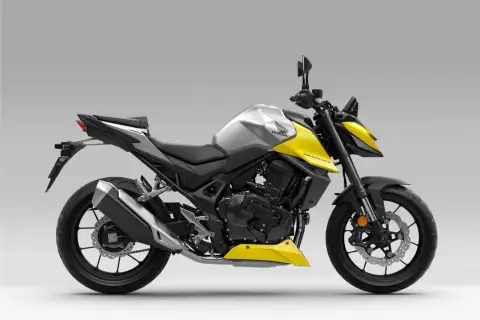 Sportliches Honda Hornet 350 Automatik Motorrad in Gelb und Silber. Ein agiler Begleiter für die Stadt.