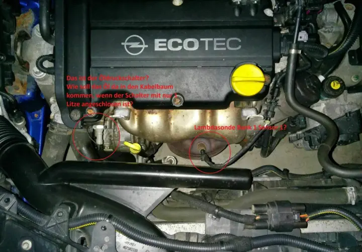 Opel Motorraum mit markiertem Öldruckschalter und Lambdasonde. Frage: Wie kommt Öl in den Kabelbaum? p0141.